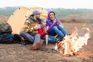 Family around campfire